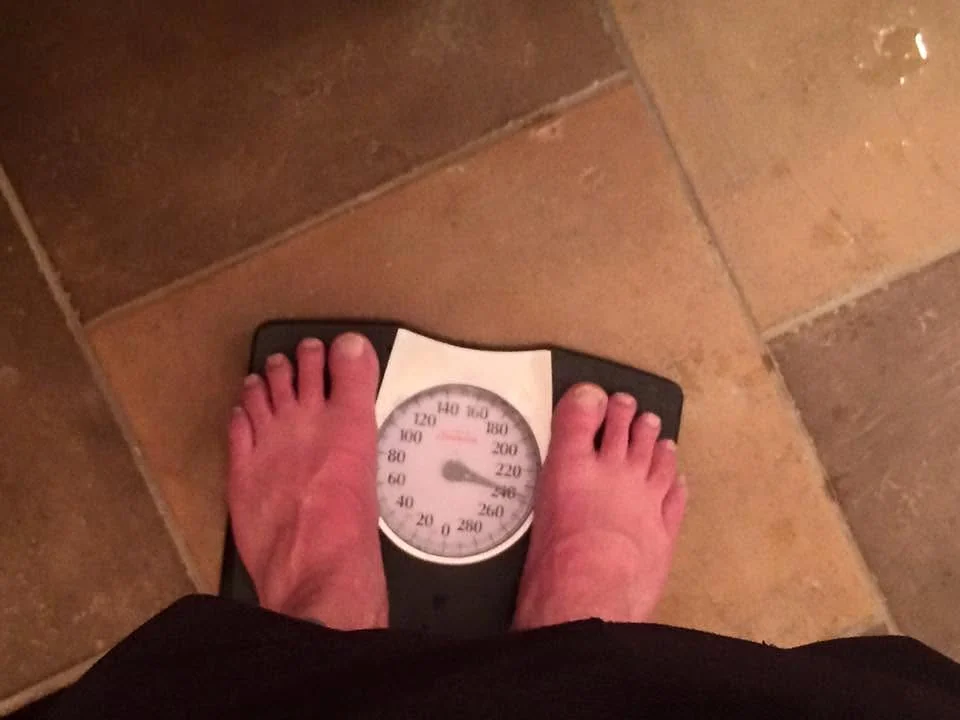 Standing on a bathroom scale